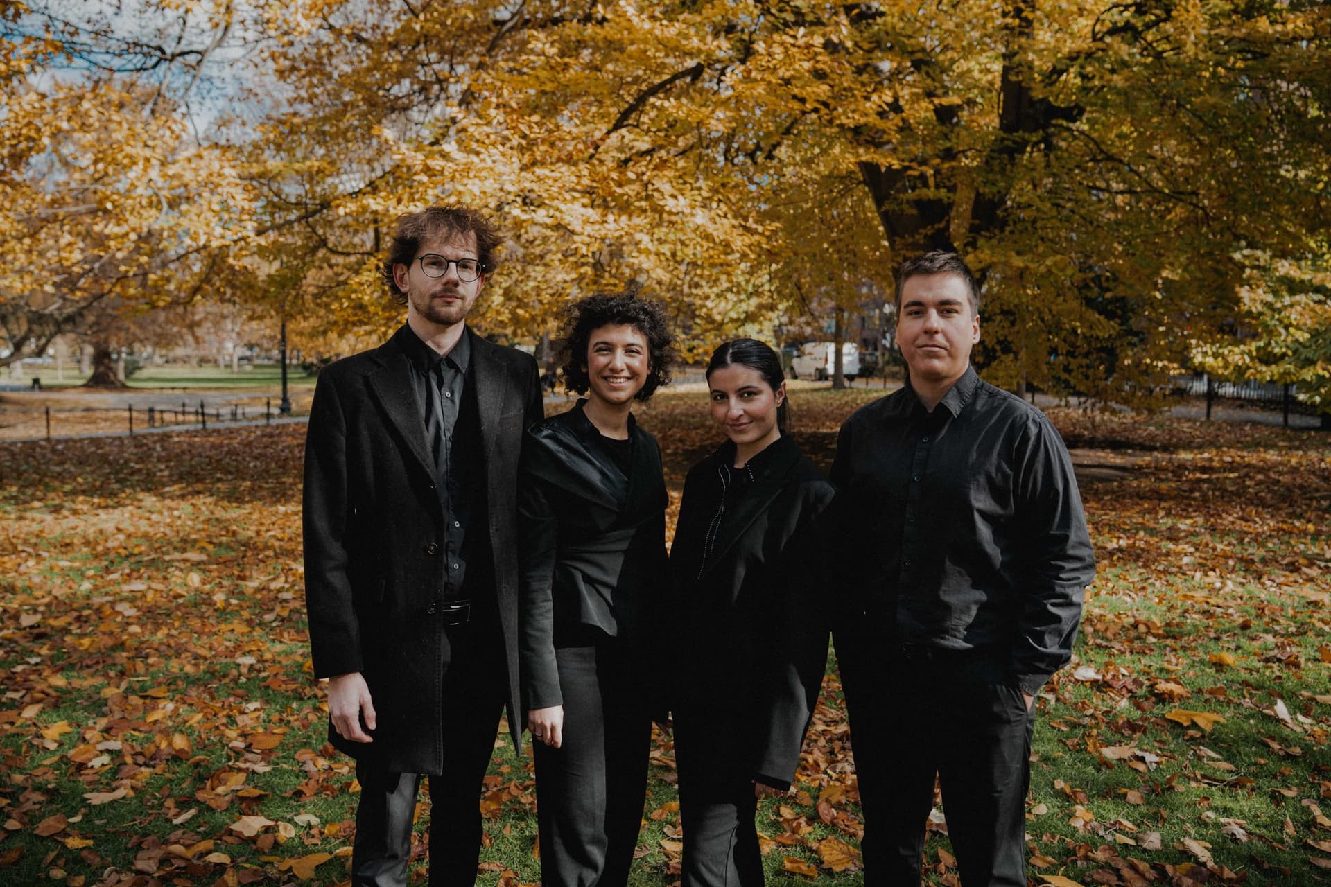 The four members of the quartet in autumn light